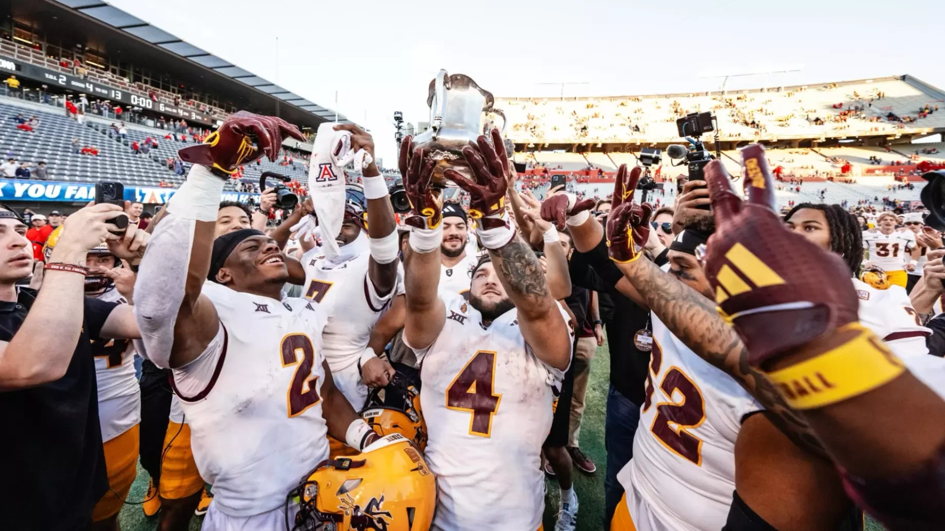 ASU Sun Devils celebrating with the Territorial Cup